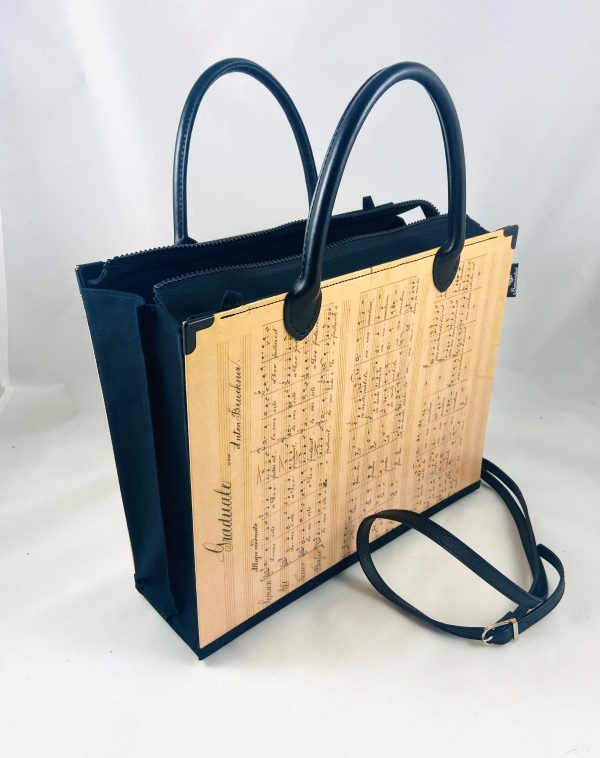 Tasche aus einer Anton Bruckner Partitur "Locus iste" mit kurzen Henkeln und langem Riemen in schwarz
